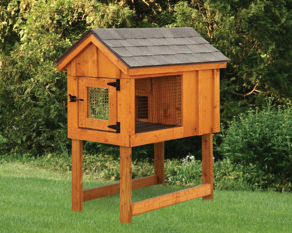 Single A-Frame Rabbit Hutch with stained board and batten siding.