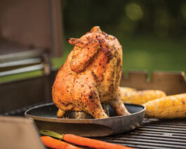 Deluxe Poultry Roaster with a chicken on it.
