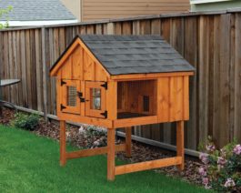 Double A-Frame Rabbit Hutch with stained board and batten siding.