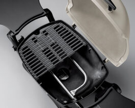 Q 1200 Gas Grill - Titanium open to show heating element.