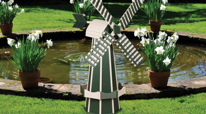 Turf Green & Ivory Windmill by a fish pond.