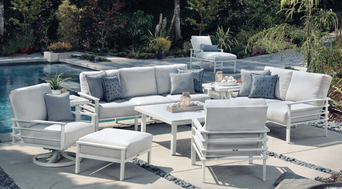 Sarasota sofa, loveseat, lounge chair, swivel lounge chair and ottoman around a fire pit.