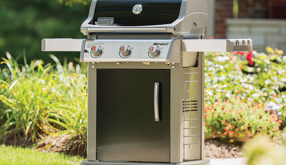 Spirit E-310 Gas Grill on a patio.