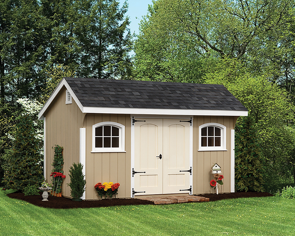 8x14 Painted Deluxe Shed in Pequea Tan, White Trim, Navajo White Door, with Granite Black Shingles in backyard.