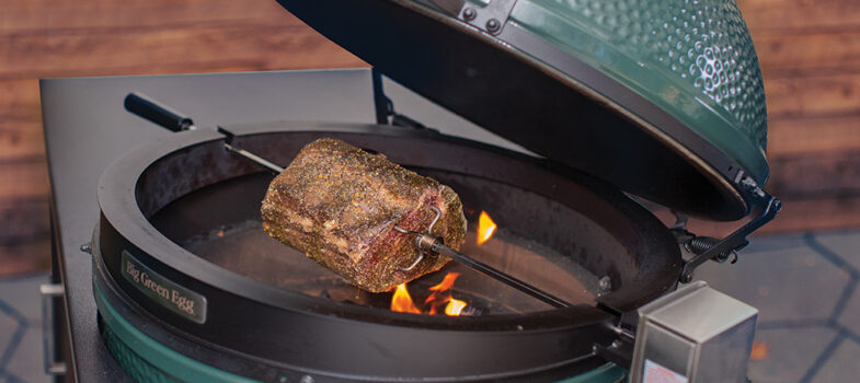 Rotisserie Kit for XL Egg with a roast on it.