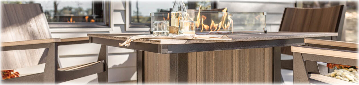 Donoma rectangular fire pit with four Mayhew chat chairs.
