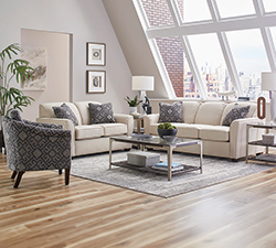 White sofa set in a living room.