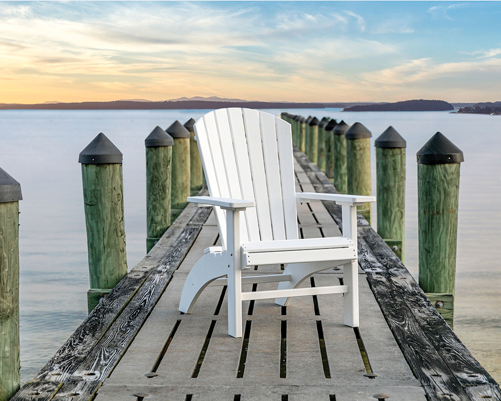 Deluxe Fanback chair in white on fishing pier.