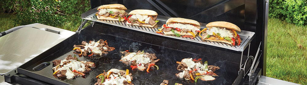 Weber 3400165 36_ Griddle Warming Rack Lifestyle Image_01 Slate Griddle Keep Warm Racks.