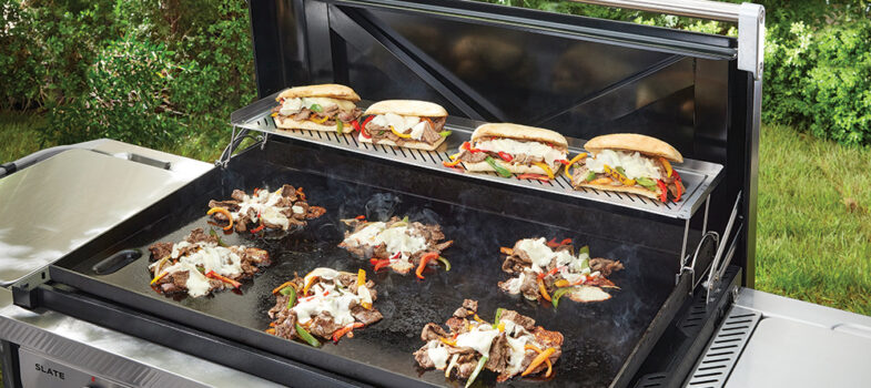 Weber 3400165 36_ Griddle Warming Rack Lifestyle Image_01 Slate Griddle Keep Warm Racks.