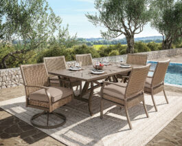 Trenton II 42x80 Table Set on a patio next to a pool.