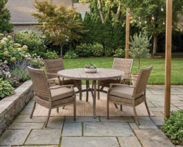 Trenton II 48Round Table Set on patio in a backyard.